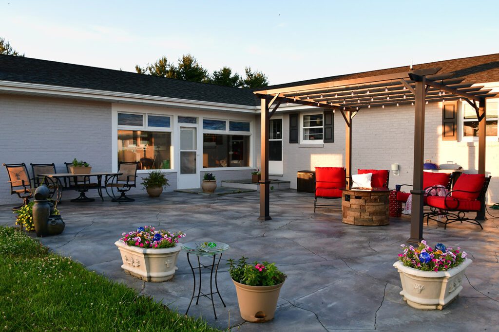 Outdoor patio with pergola over fire pit