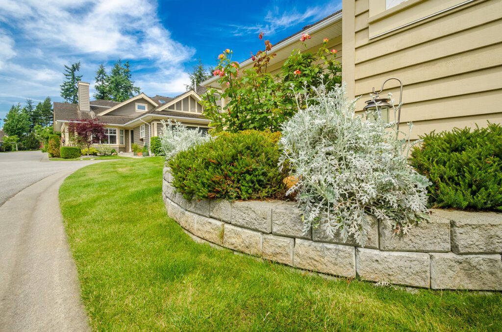 block retaining wall for planter next to home